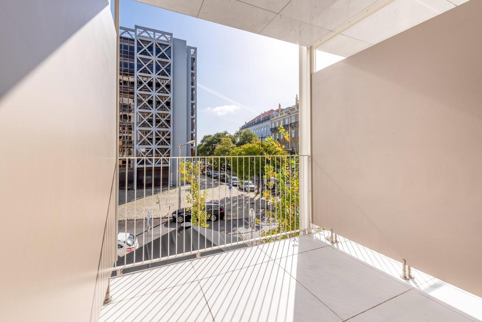 Appartement Guestready - 2br Apt Carlos I With Terrace And Gym Lissabon