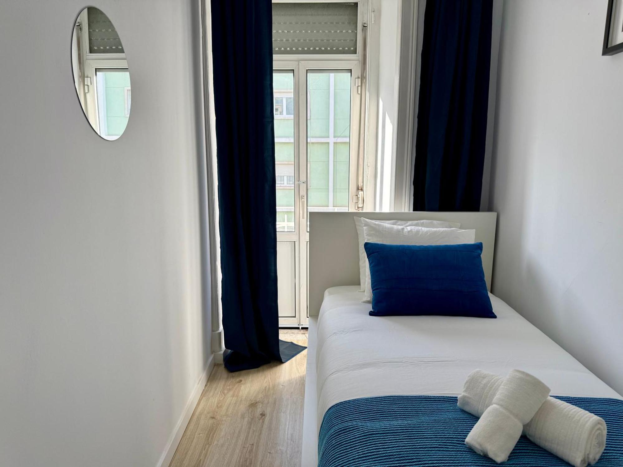 Quarto em Acomodações Particulares Travelers House *