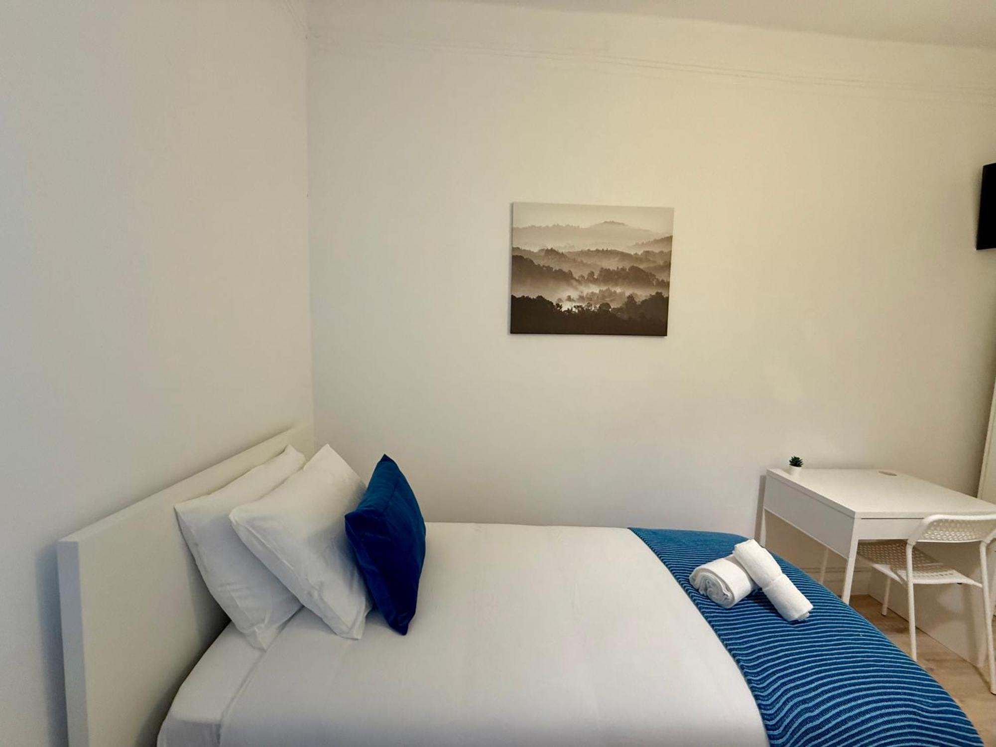 Quarto em Acomodações Particulares Travelers House *