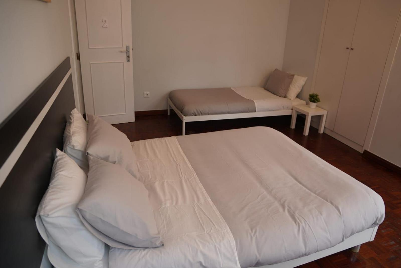 Quarto em Acomodações Particulares Bisengototo Homestay *