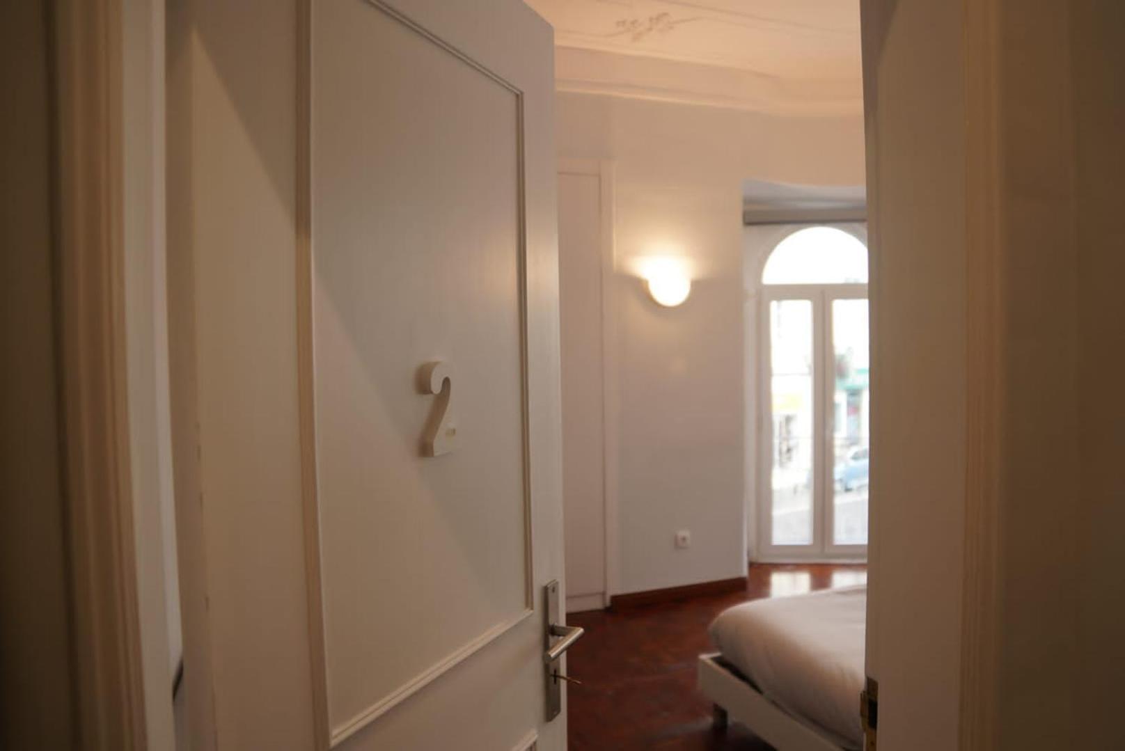 Quarto em Acomodações Particulares Bisengototo Homestay *