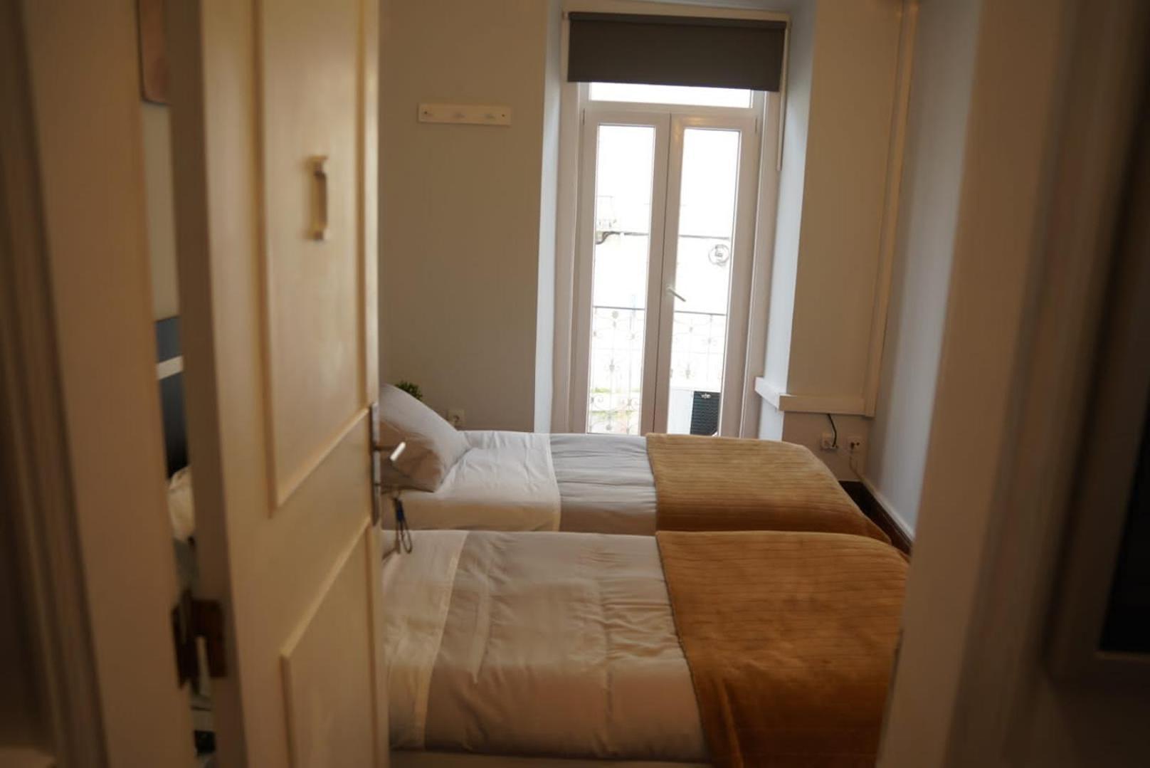 Quarto em Acomodações Particulares Bisengototo Homestay Lisboa