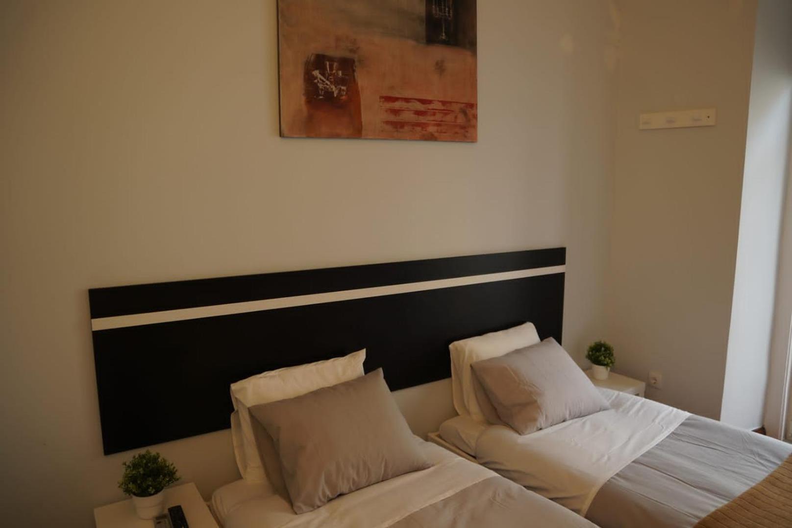 Quarto em Acomodações Particulares Bisengototo Homestay *